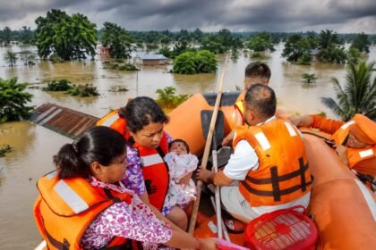 Rescue teams evacuating residents from flood-affected areas in Assam as severe monsoon flooding continues.