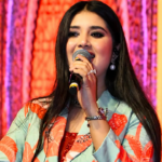 Singer Ishita Vishwakarma receives the Kishore Award 2026 during the award ceremony in Madhya Pradesh.