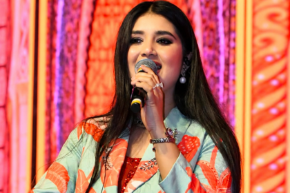 Singer Ishita Vishwakarma receives the Kishore Award 2026 during the award ceremony in Madhya Pradesh.