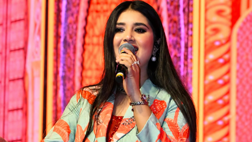 Singer Ishita Vishwakarma receives the Kishore Award 2026 during the award ceremony in Madhya Pradesh.
