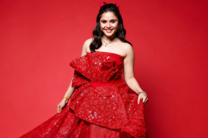 Muskan Bamne wearing a glamorous red gown for an exclusive fashion photoshoot.