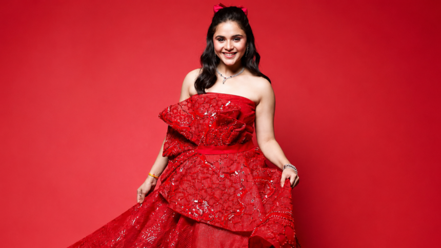 Muskan Bamne wearing a glamorous red gown for an exclusive fashion photoshoot.