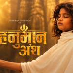 Vihaan Shedge in a devotional poster-style image for Hanuman Ansh, dressed in white and holding a wooden staff.